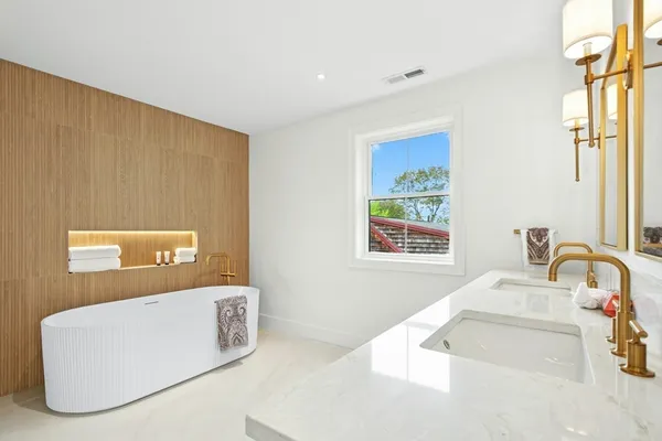 a bedroom with a bed and a cabinets
