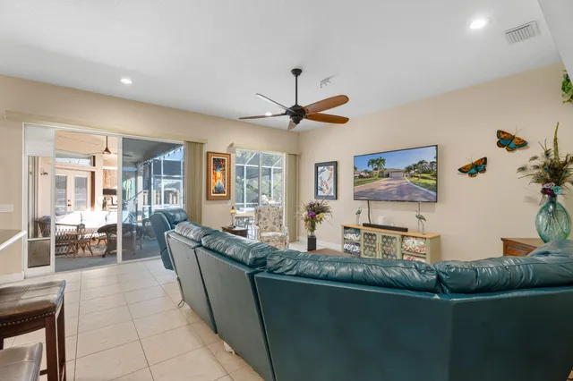 a living room with granite countertop furniture and a large window