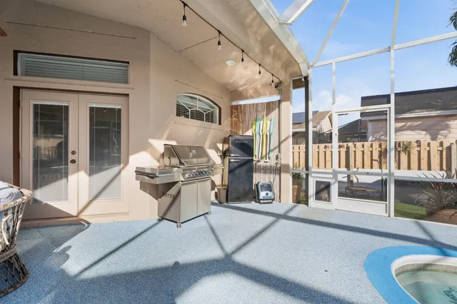 a living room with wooden floor furniture and a fireplace