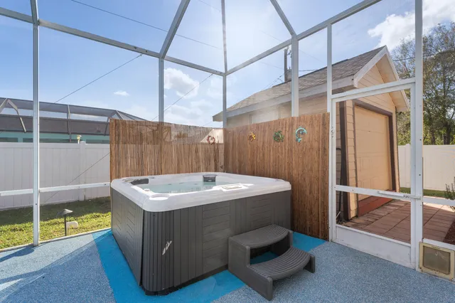 a backyard of a house with seating space