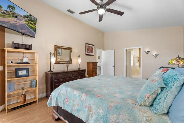 a view of a hallway to a bedroom