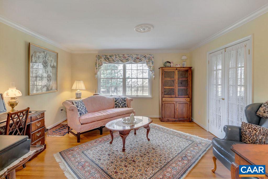 4703 Wesley Chapel Road Free Union, VA 22940 - Photo 5 of 44 a living room with furniture a rug and a window