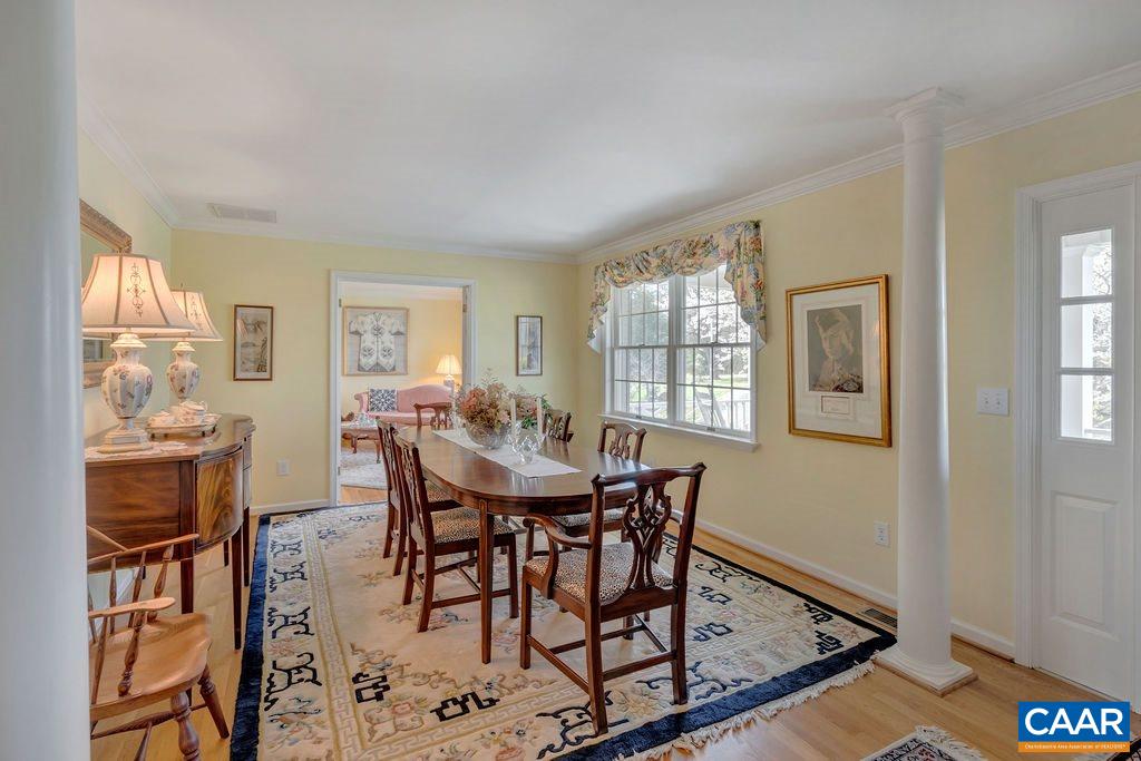 4703 Wesley Chapel Road Free Union, VA 22940 - Photo 6 of 44 a view of a dining room with furniture and a window