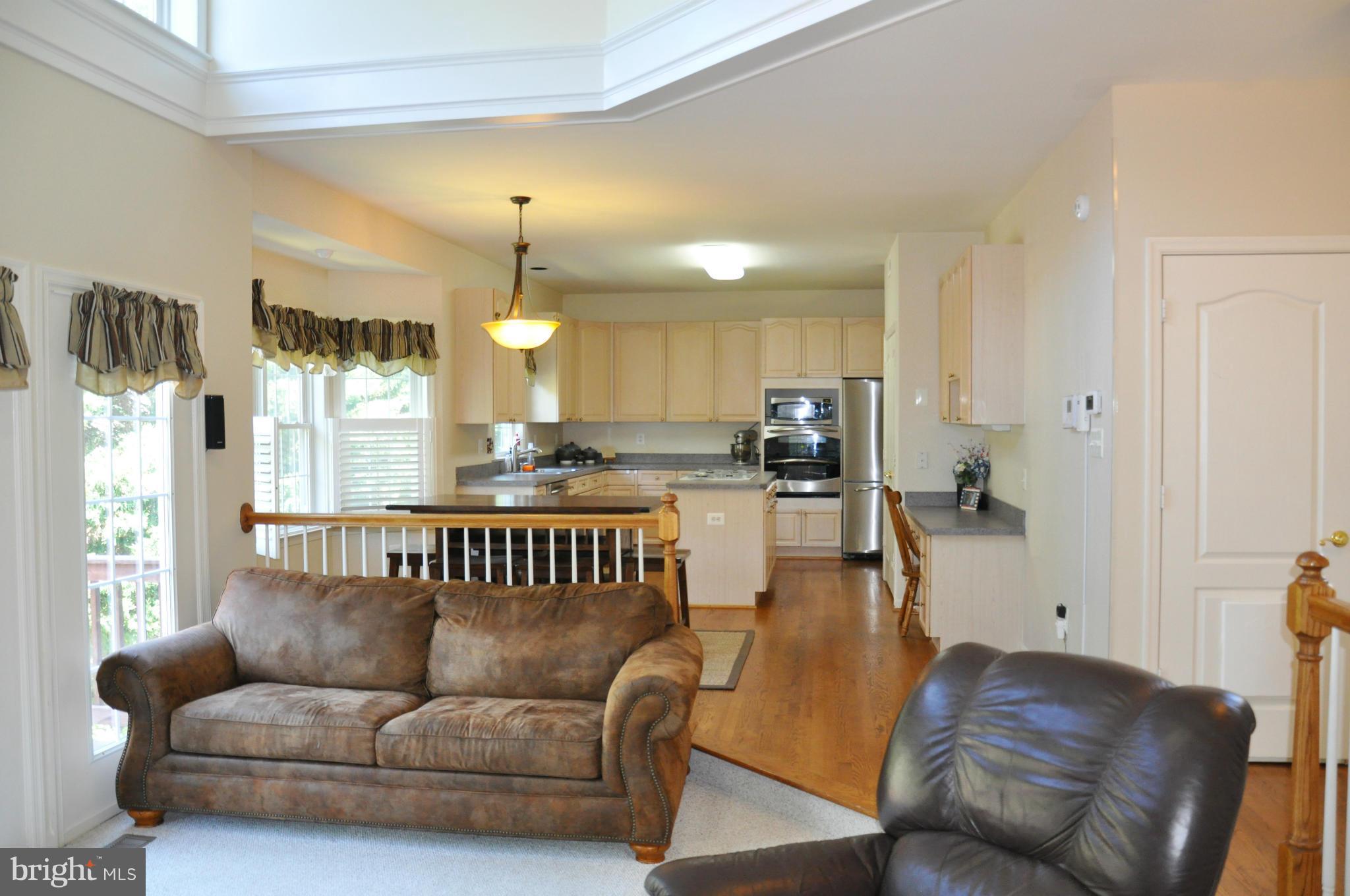 2585 Bear Den Road Frederick, MD 21701 - Photo 16 of 30 a living room with furniture and a large window