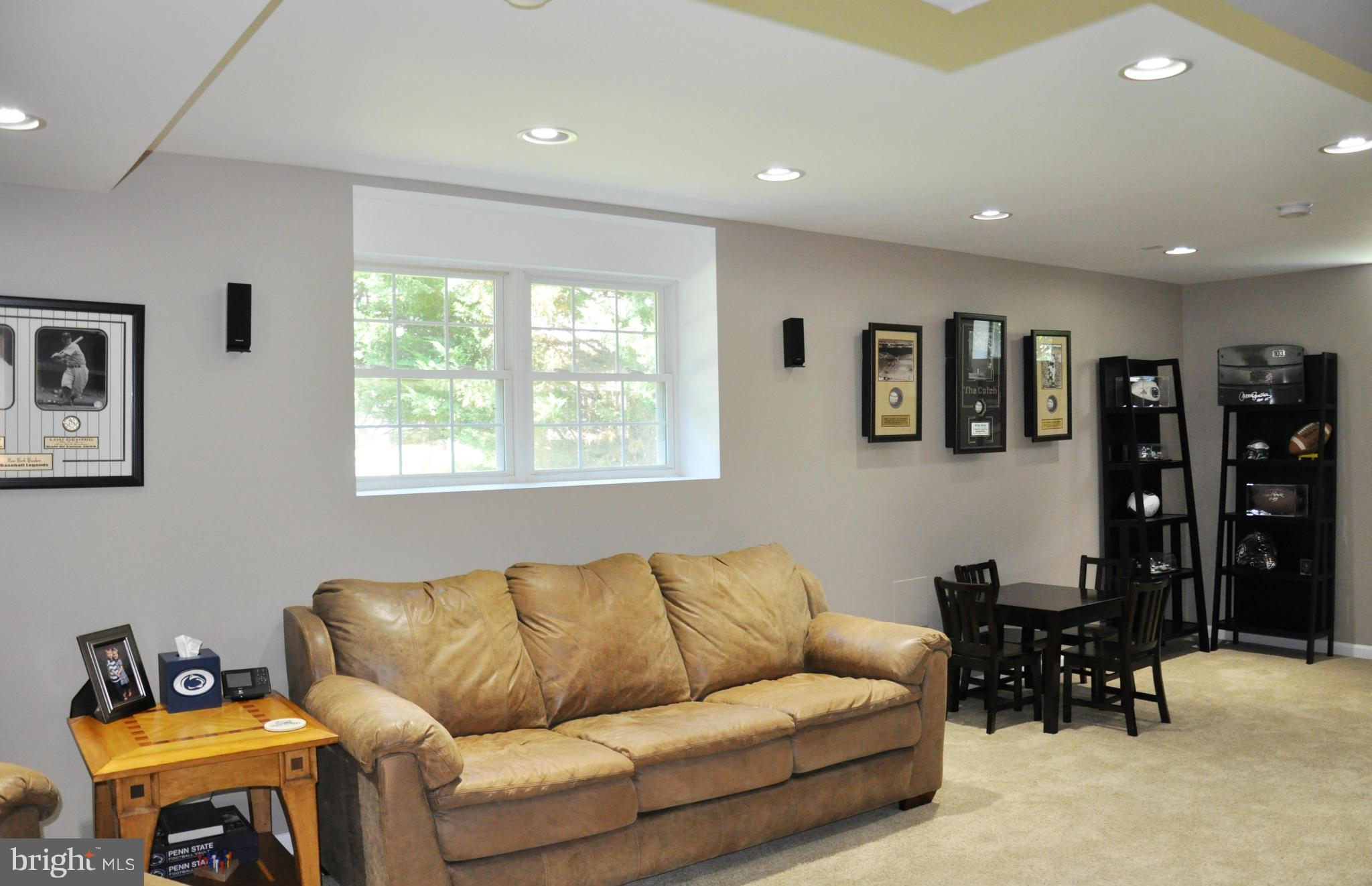 2585 Bear Den Road Frederick, MD 21701 - Photo 21 of 30 a living room with furniture and a window