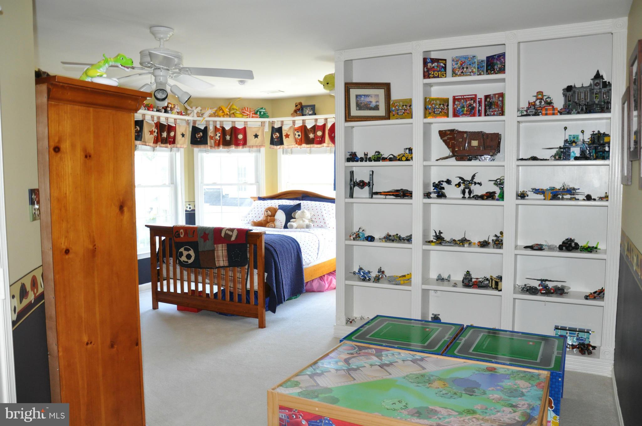 2585 Bear Den Road Frederick, MD 21701 - Photo 29 of 30 a bedroom with furniture and a book shelf