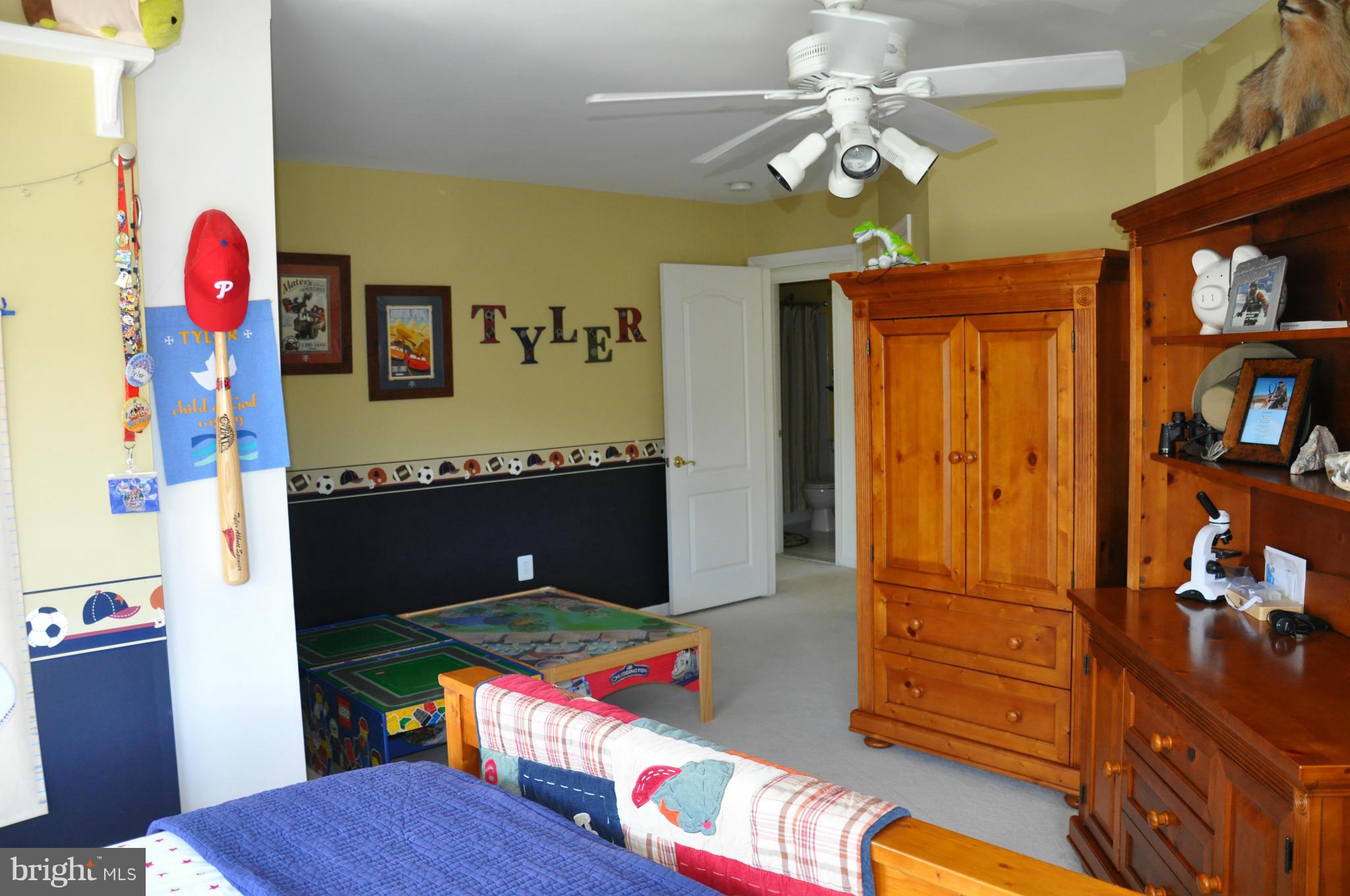 2585 Bear Den Road Frederick, MD 21701 - Photo 30 of 30 a living room with furniture and a bookshelf