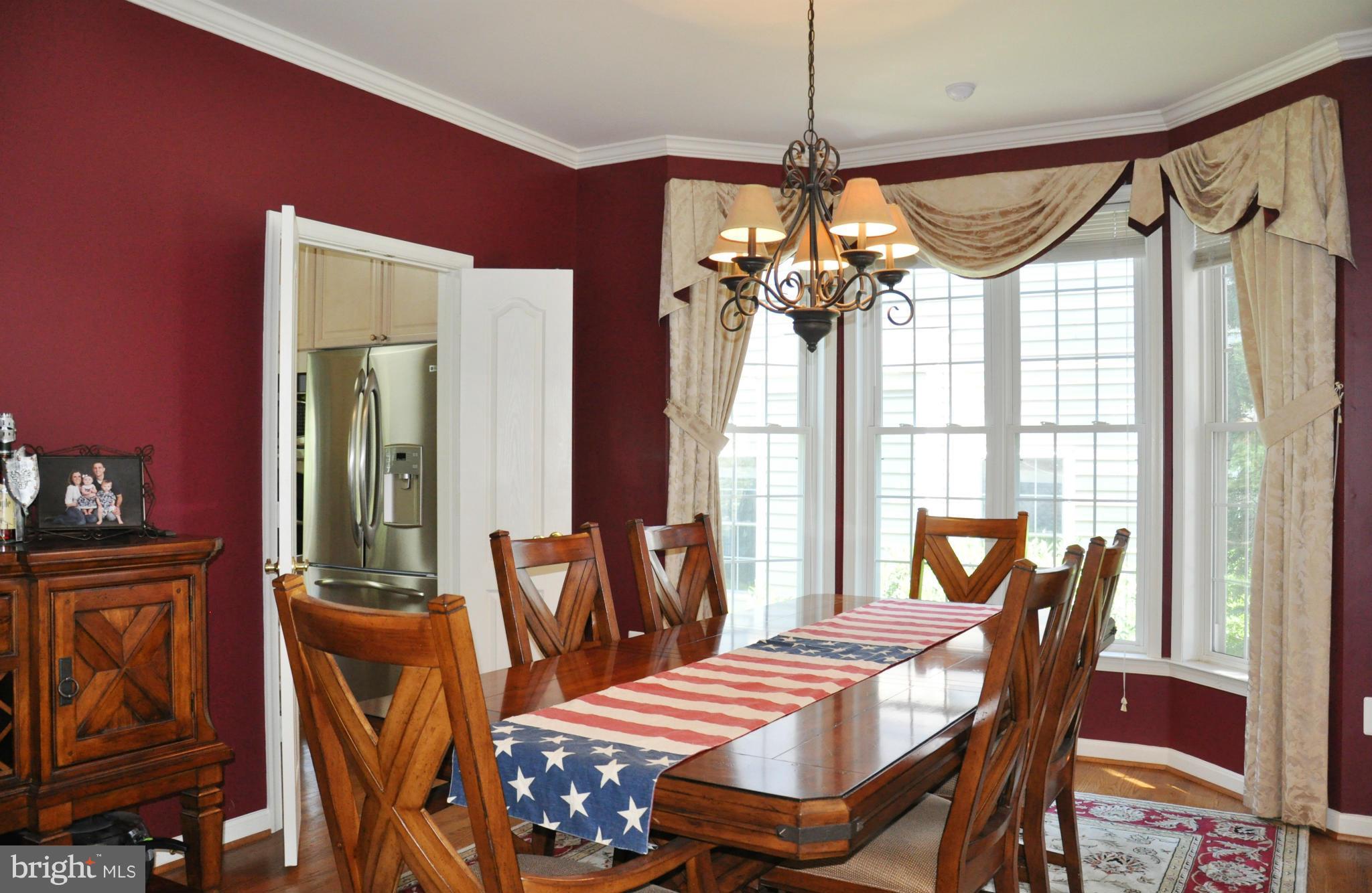 2585 Bear Den Road Frederick, MD 21701 - Photo 10 of 30 a view of a dining room with furniture and window