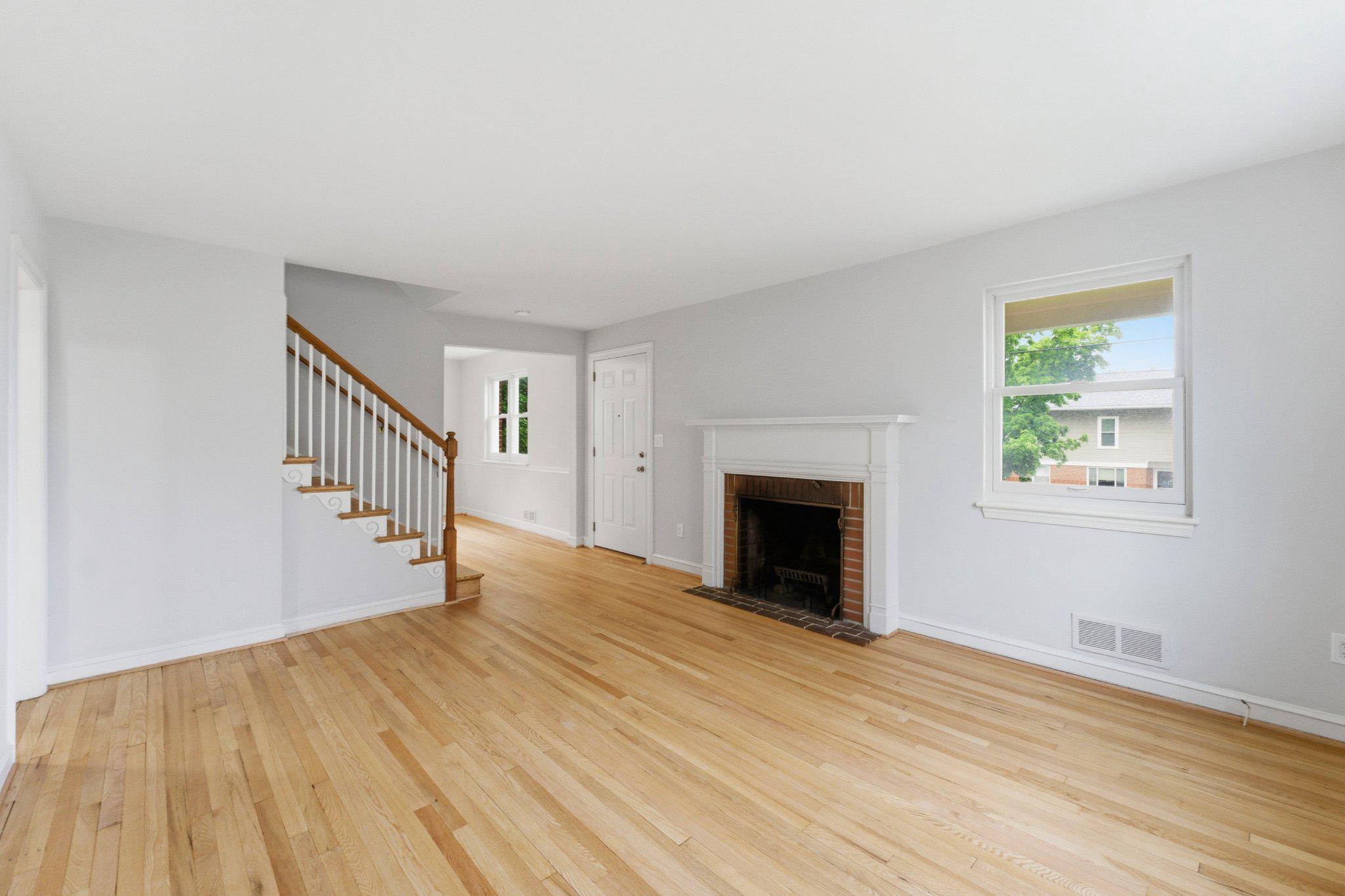 10143 Dallas Avenue Silver Spring, MD 20901 - Photo 11 of 49 Living Room w/ Wood-Burning Fireplace