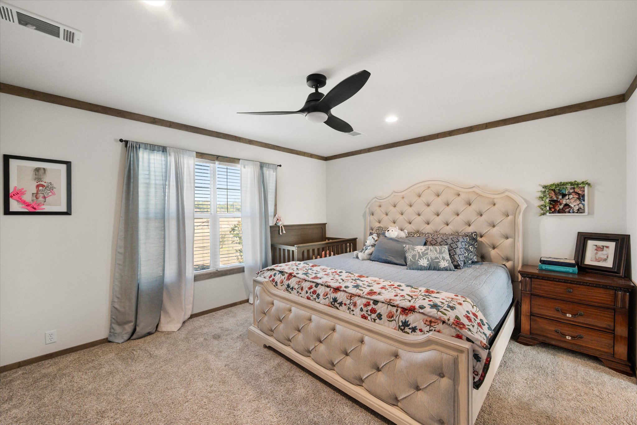 16857 Fm 639 Road East Purdon, TX 76679 - Photo 25 of 38 Bedroom with ornamental molding, light carpet, a ceiling fan, and recessed lighting