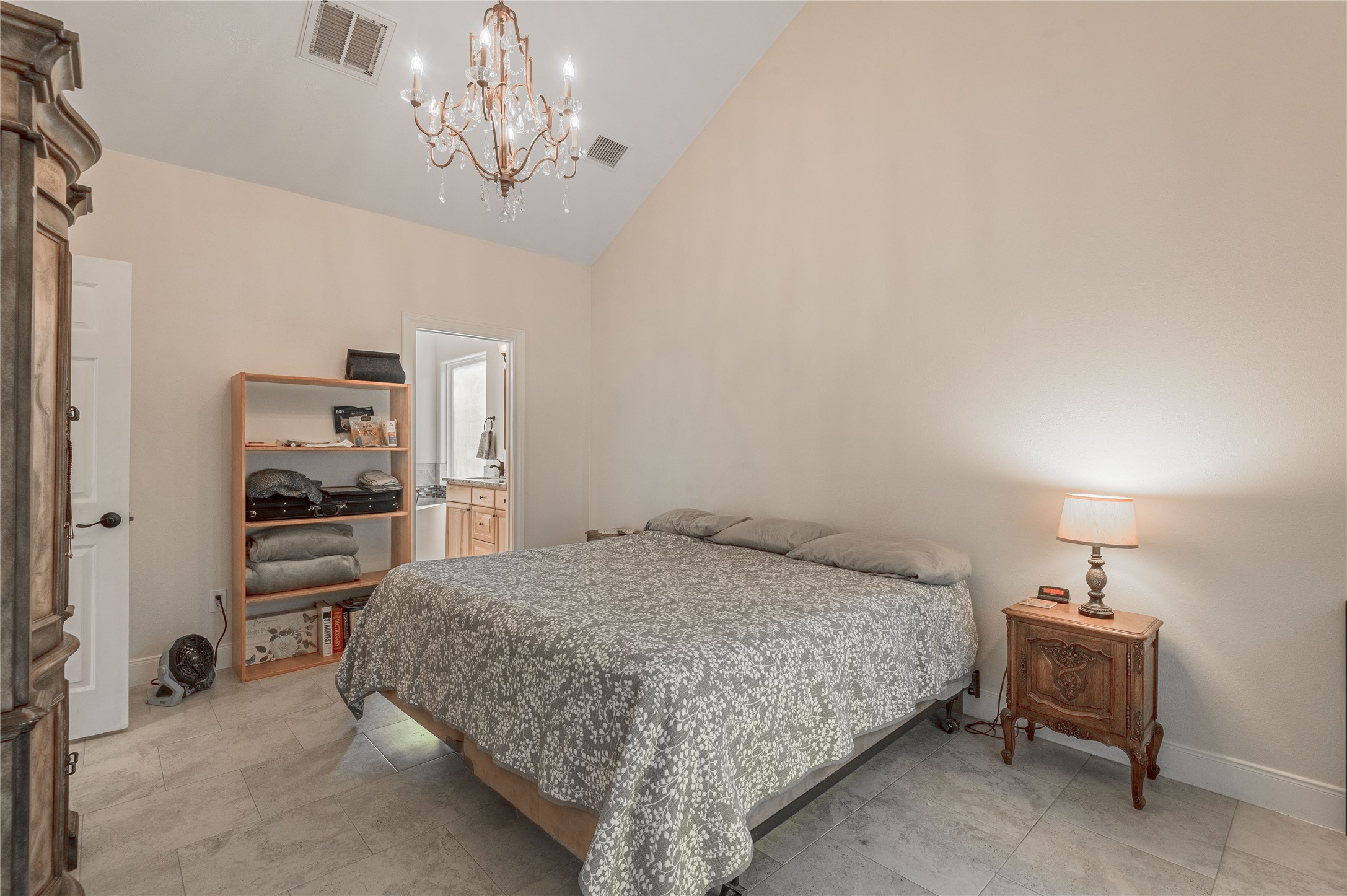 2803 Fm 2158 Midway, TX 75852 - Photo 17 of 49 a bedroom with a bed and a chandelier