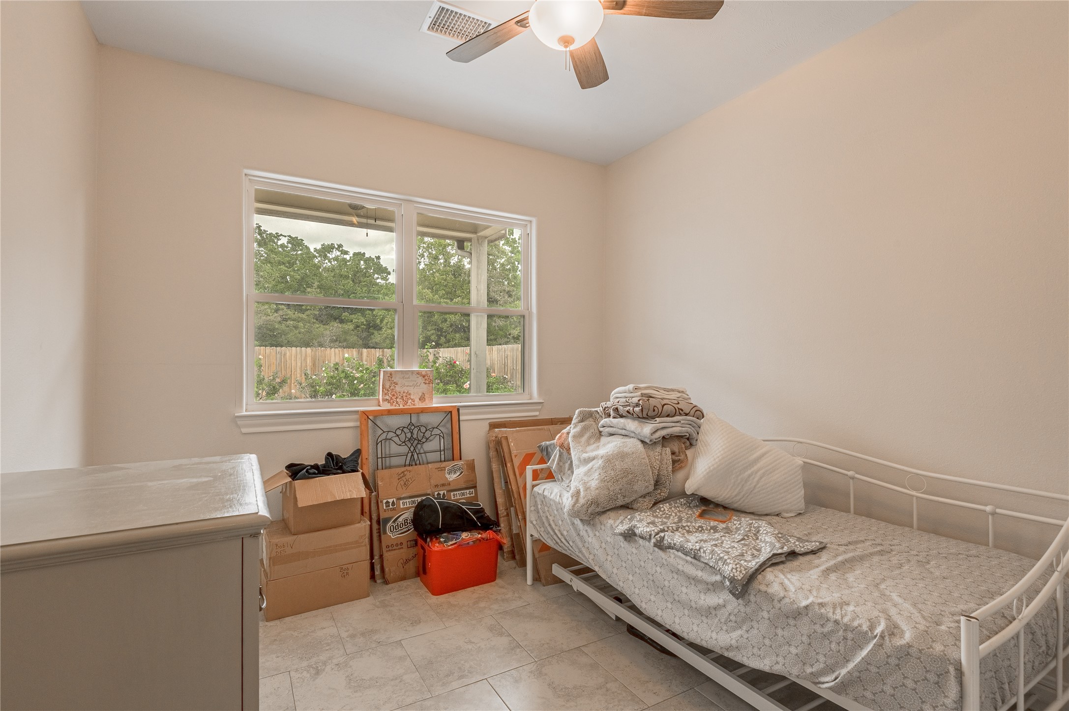 2803 Fm 2158 Midway, TX 75852 - Photo 24 of 49 a bedroom with furniture and a large window