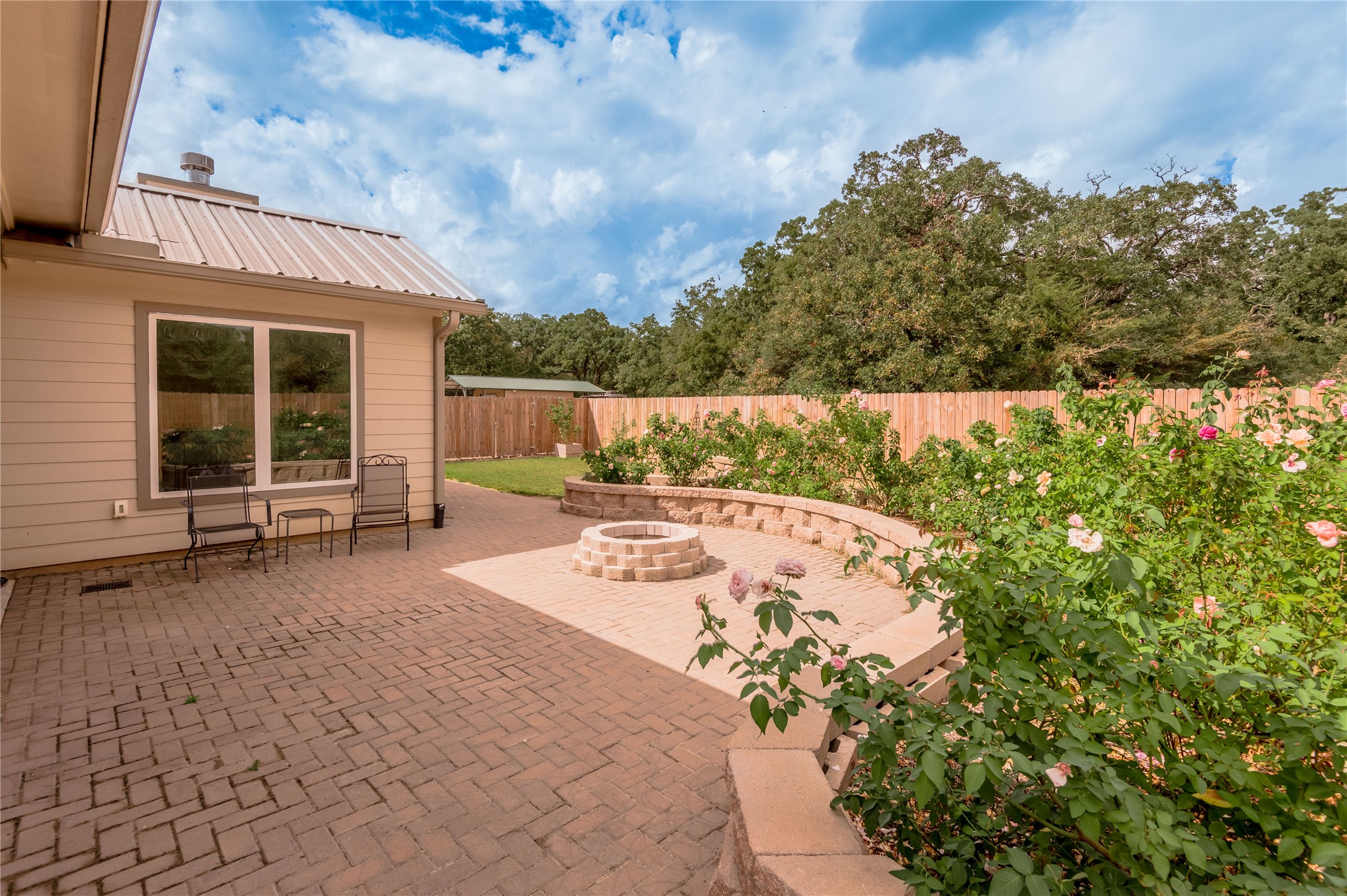 2803 Fm 2158 Midway, TX 75852 - Photo 29 of 49 a view of a backyard with a garden and sitting area