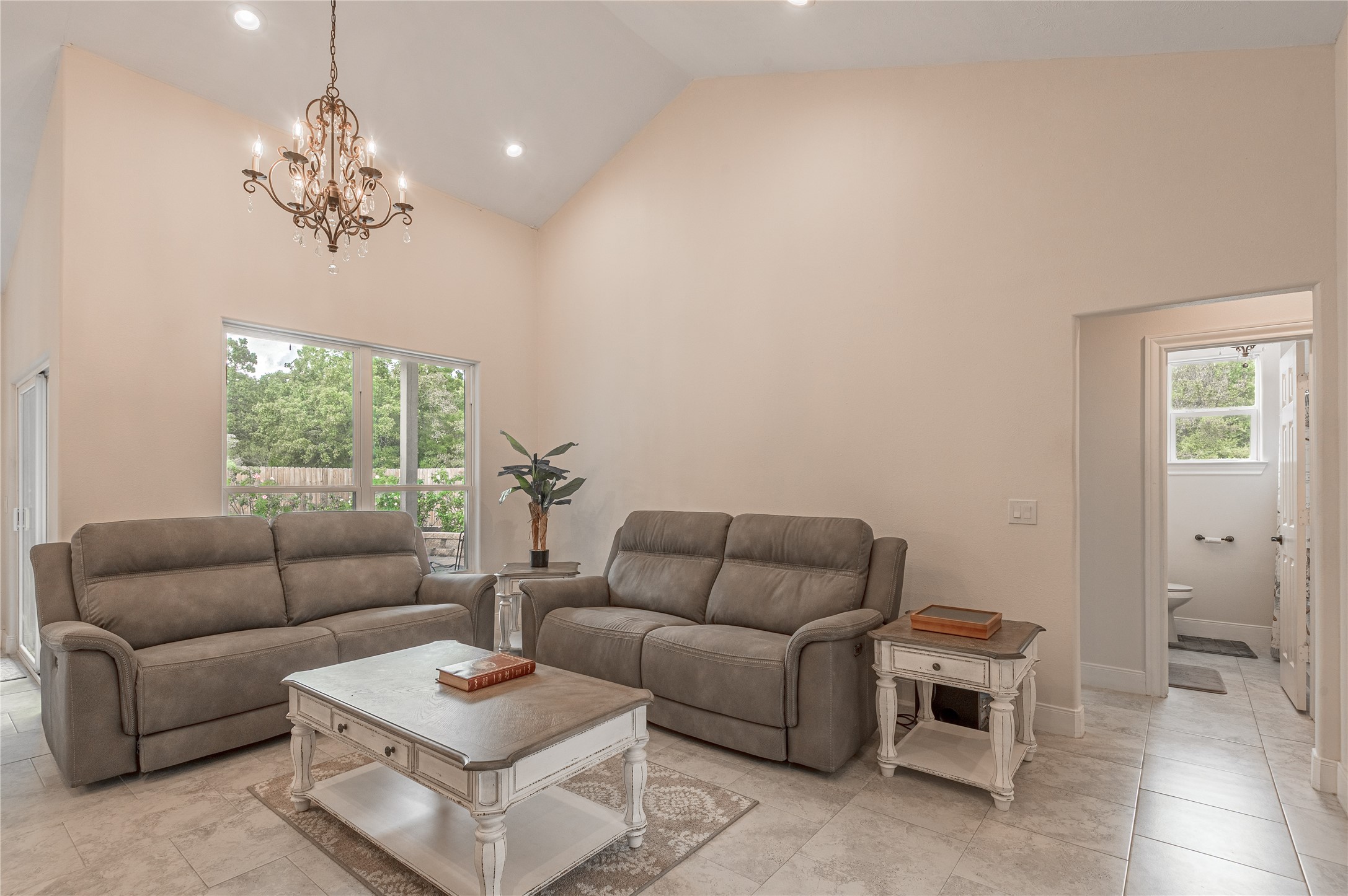 2803 Fm 2158 Midway, TX 75852 - Photo 7 of 49 a living room with furniture a chandelier and a window