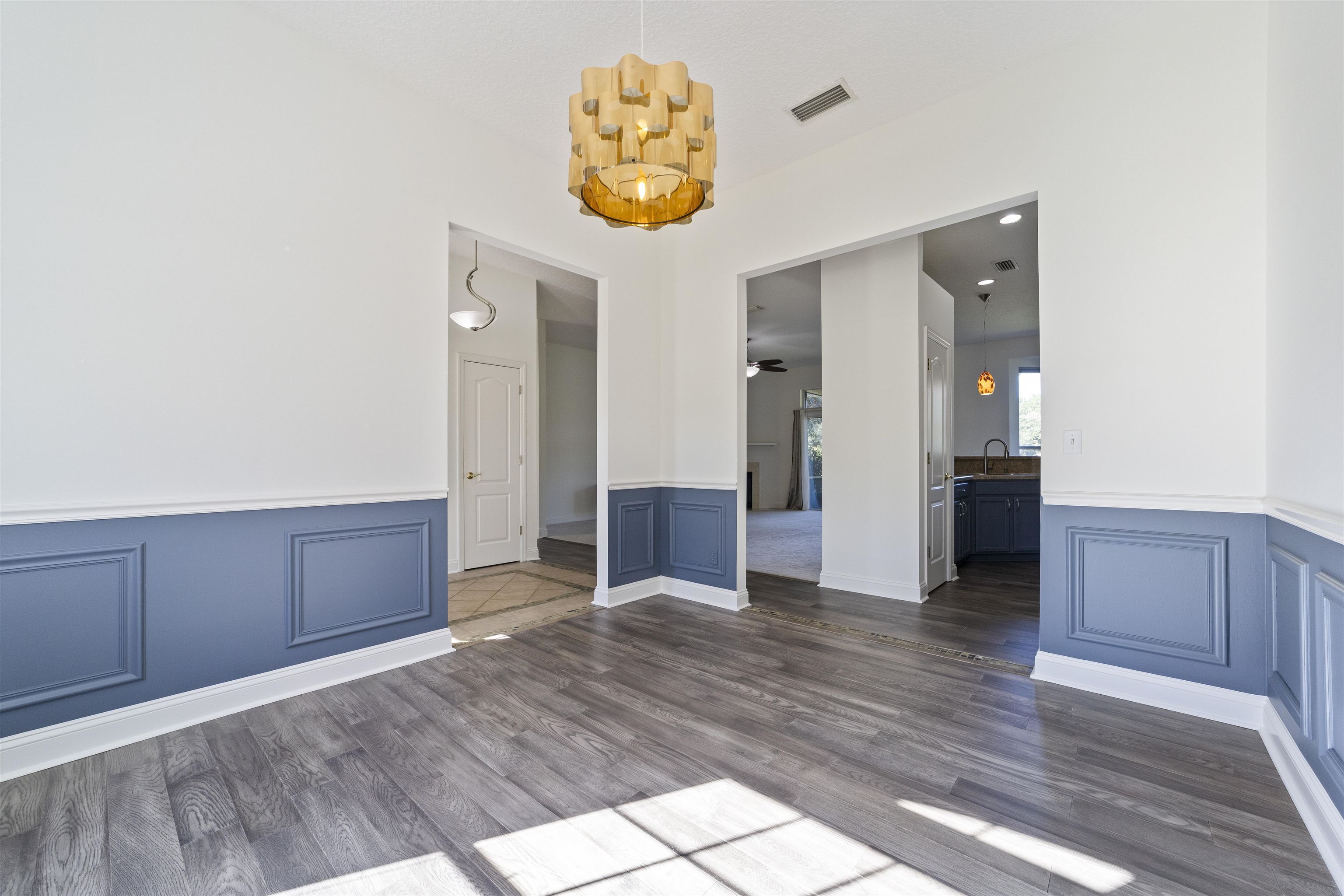 145 Whisper Ridge Drive St. Augustine, FL 32092 - Photo 14 of 43 wooden floor in an empty room