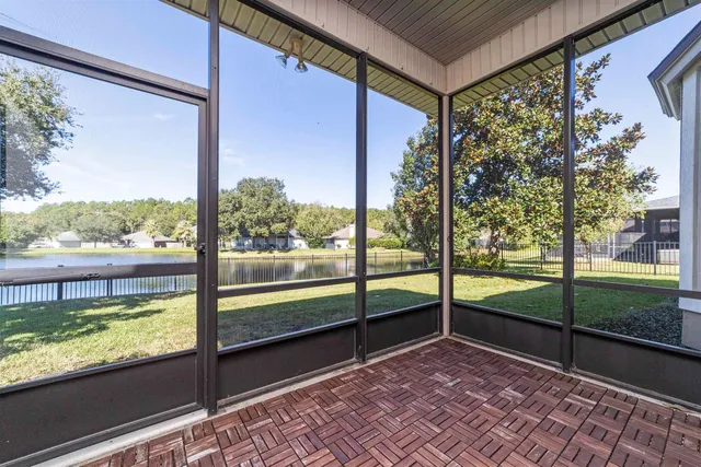 a spacious bathroom with a sink and a mirror