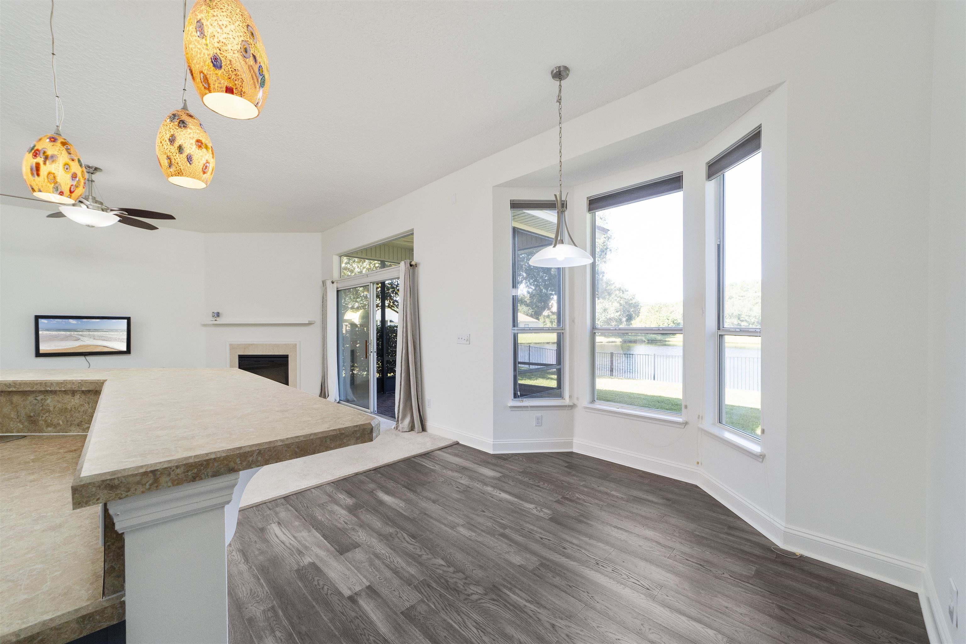 145 Whisper Ridge Drive St. Augustine, FL 32092 - Photo 23 of 43 a spacious bedroom with a bed and a window