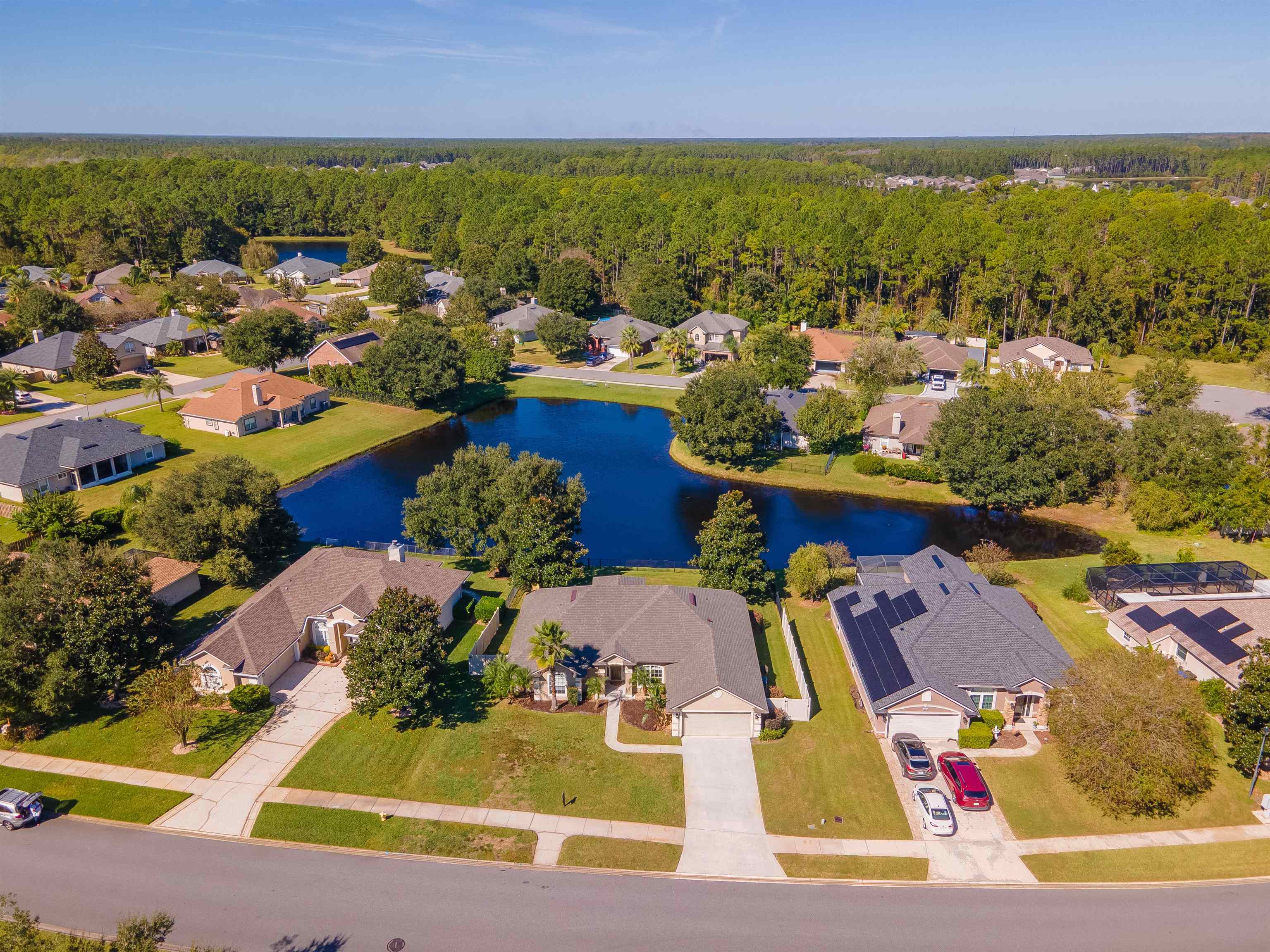 145 Whisper Ridge Drive St. Augustine, FL 32092 - Photo 3 of 43 an aerial view of residential houses with outdoor space