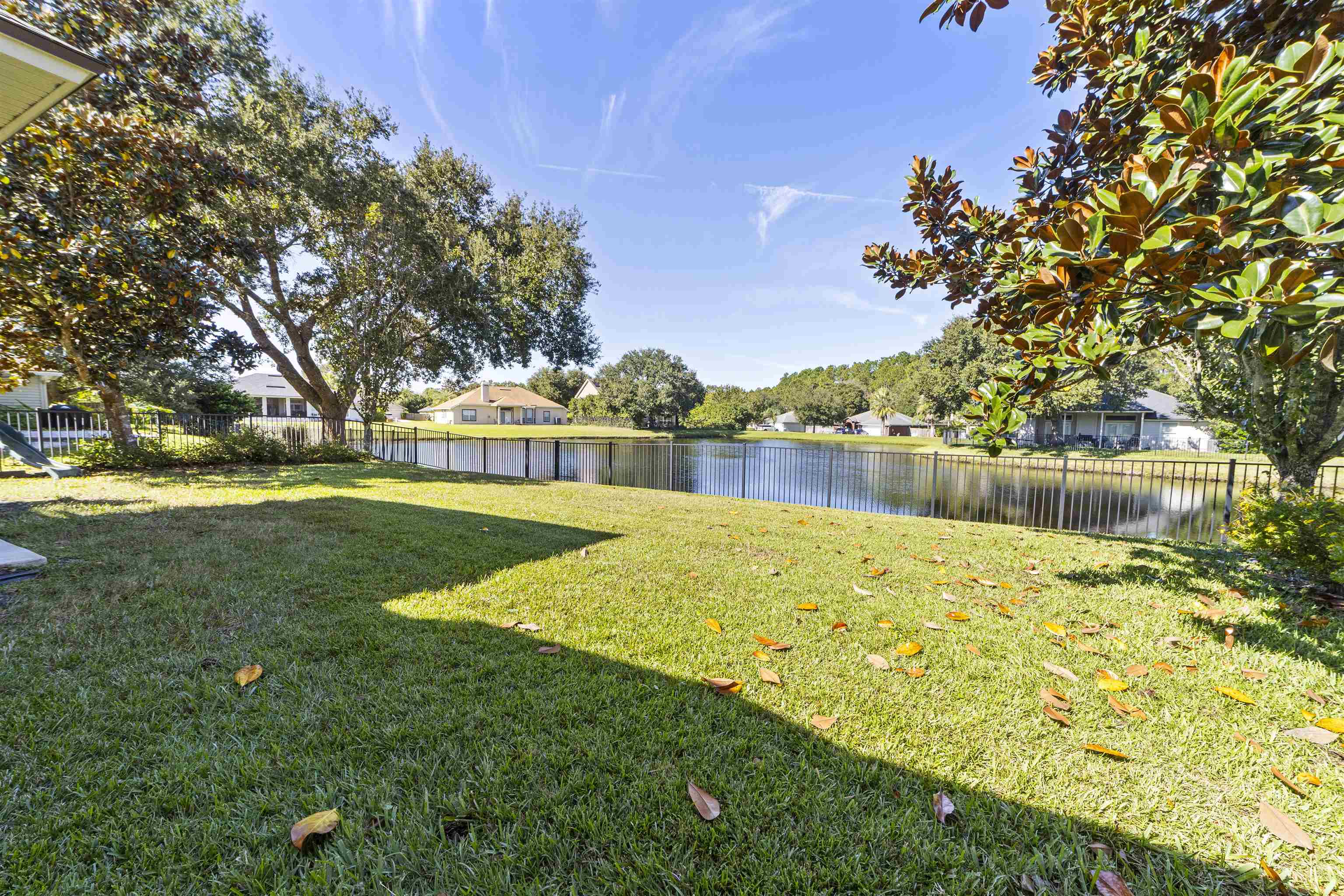 145 Whisper Ridge Drive St. Augustine, FL 32092 - Photo 7 of 43 a view of yard with swimming pool and green space