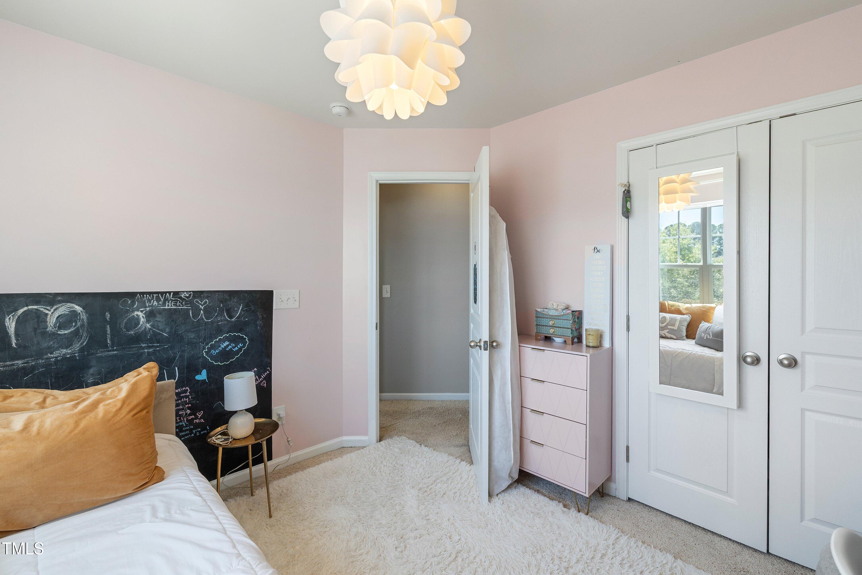 9352 Wooden Road Raleigh, NC 27617 - Photo 38 of 43 wooden floor with a chandelier in a room