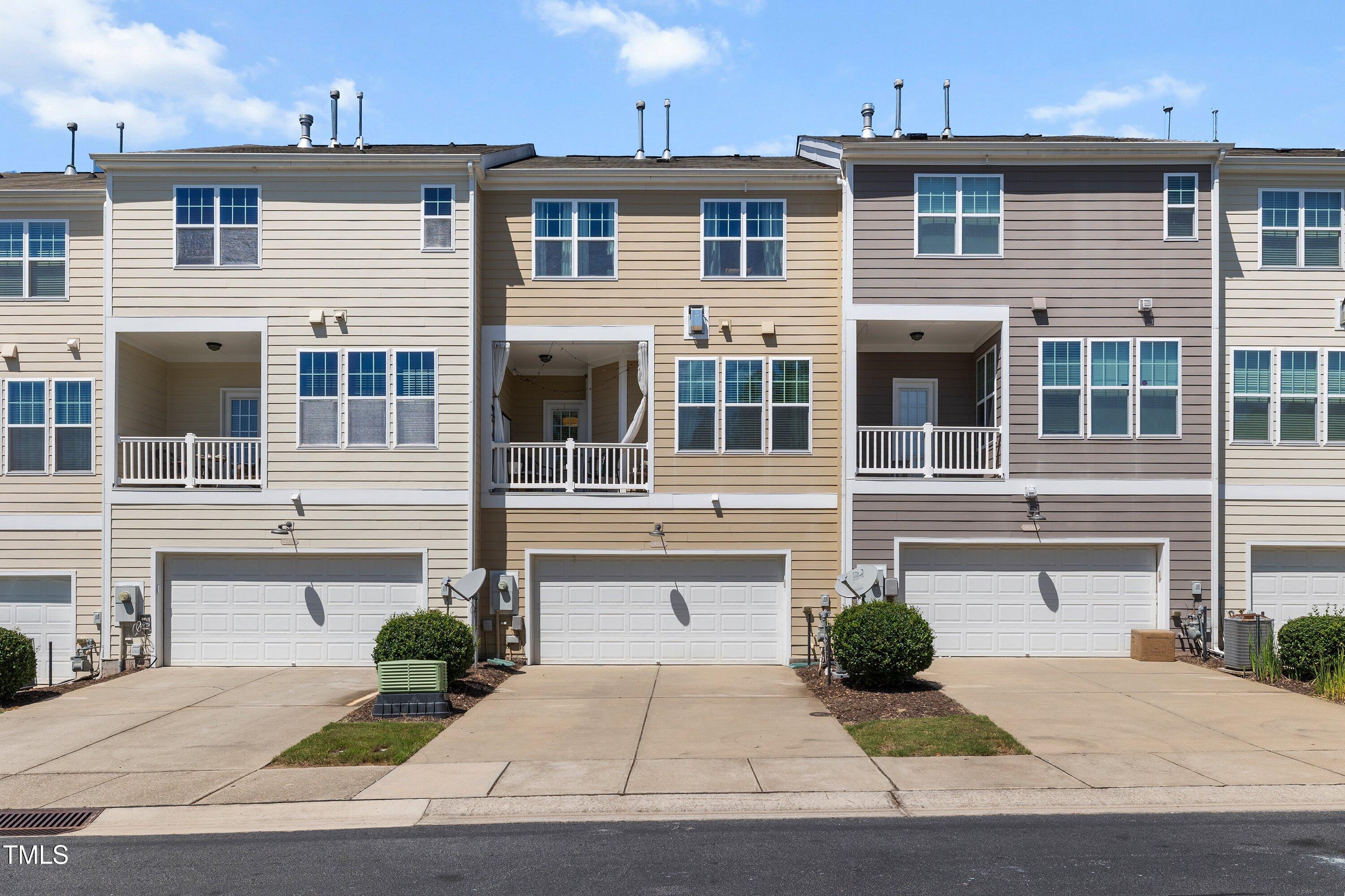 9352 Wooden Road Raleigh, NC 27617 - Photo 41 of 43 a front view of a house with porch