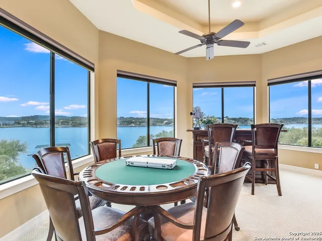 a view of a dining room with furniture window and outside view