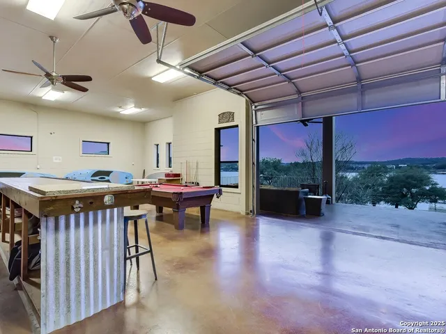 a room with lots of table and chairs