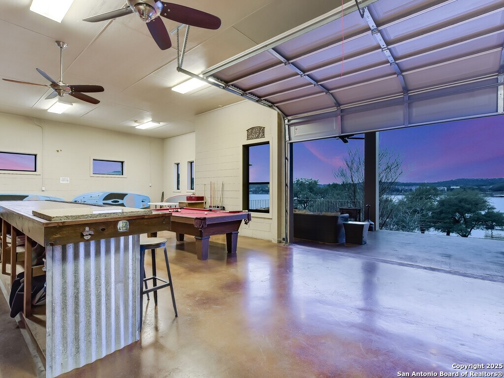 21913 Mockingbird Street Lago Vista, TX 78645 - Photo 27 of 39 a room with lots of table and chairs