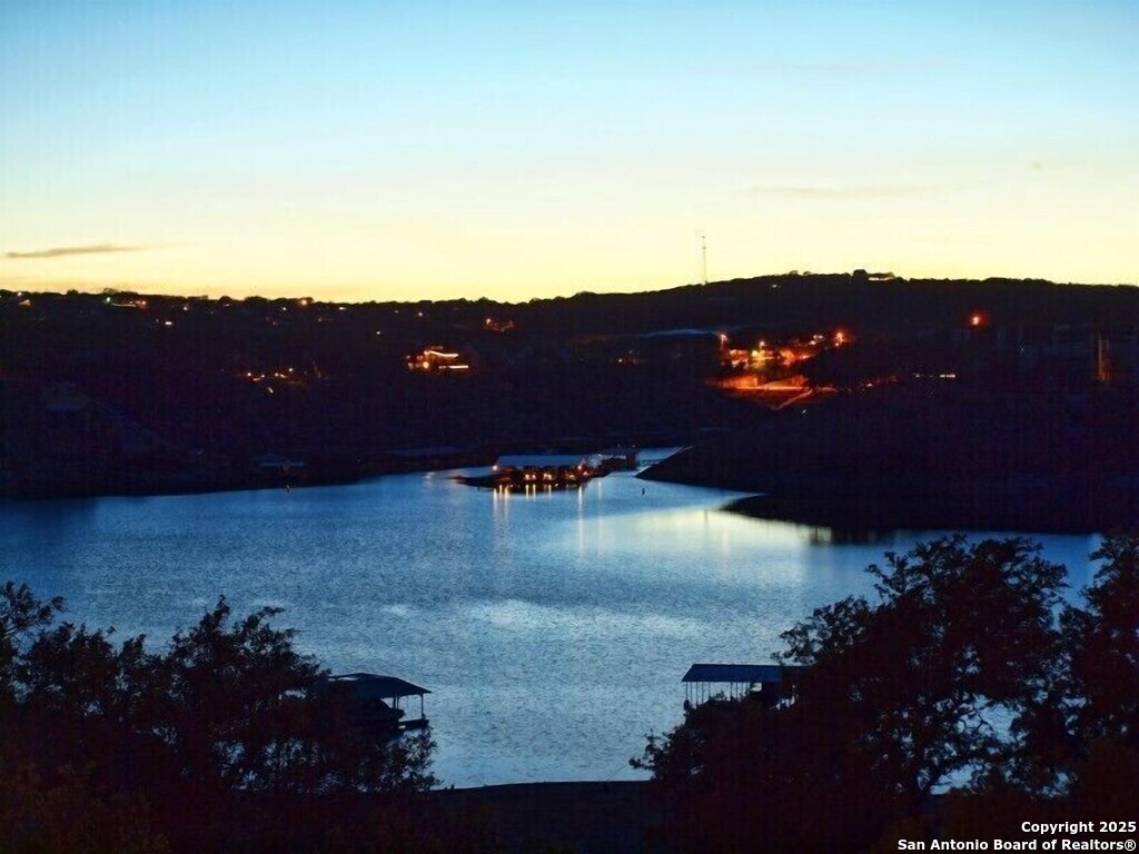 21913 Mockingbird Street Lago Vista, TX 78645 - Photo 38 of 39 a view of a backyard