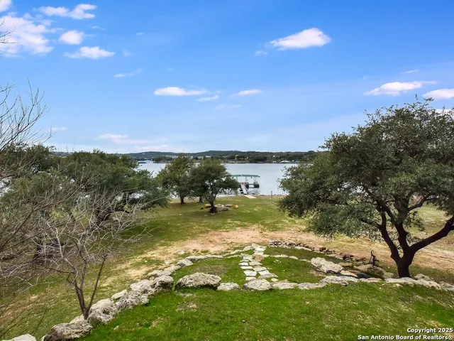 a view of a lake from a yard