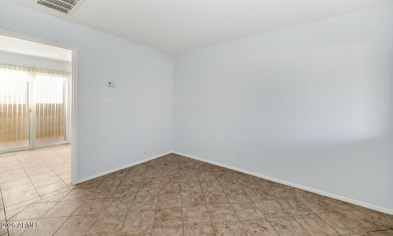 822 East Carol Avenue Phoenix, AZ 85020 - Photo 13 of 25 an empty room with sliding door