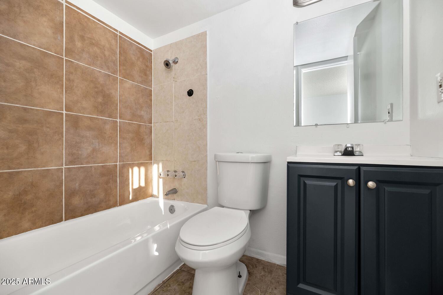 822 East Carol Avenue Phoenix, AZ 85020 - Photo 16 of 25 a bathroom with a sink toilet and shower