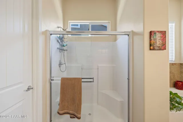 a living room with furniture and window