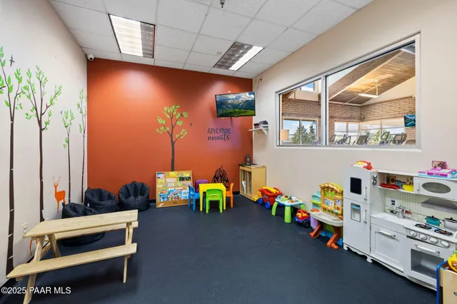 front view of a house with a street sign