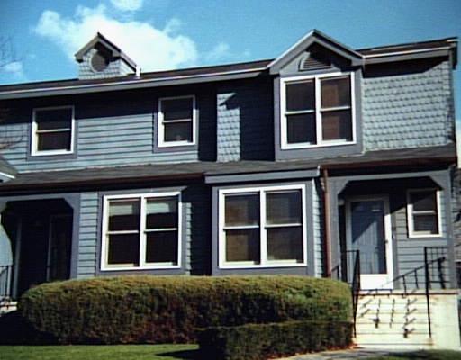 a view of front a house with a yard