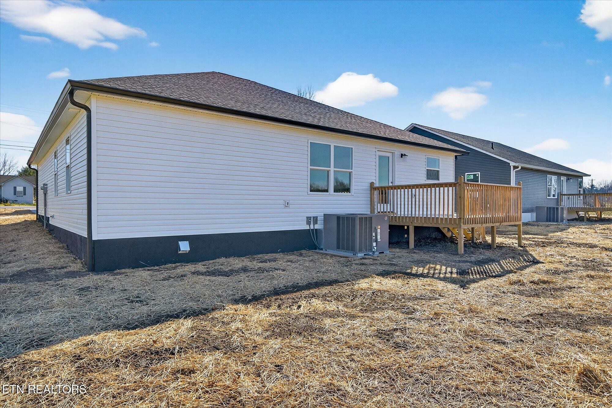 1311 Cook Road Crossville, TN 38555 - Photo 24 of 32 a view of a house with a yard