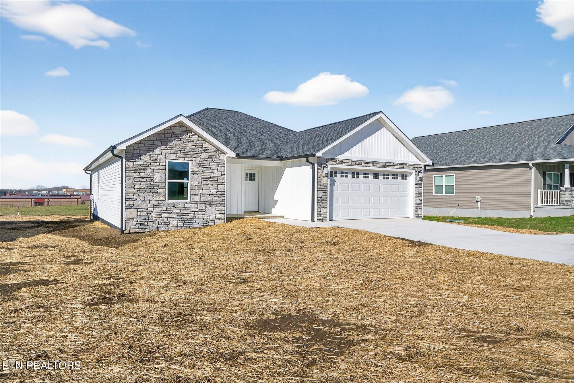 1311 Cook Road Crossville, TN 38555 - Photo 26 of 32 a view of a house with a swimming pool and yard