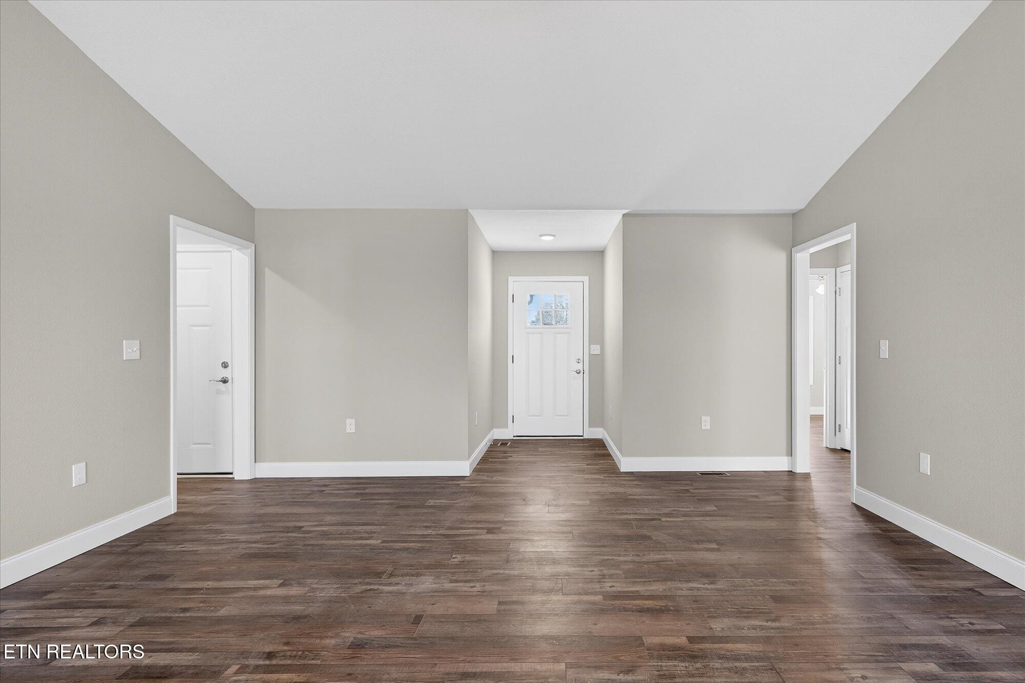 1311 Cook Road Crossville, TN 38555 - Photo 3 of 32 a view of an empty room with wooden floor