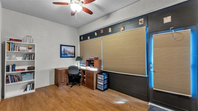 a workspace with furniture and window