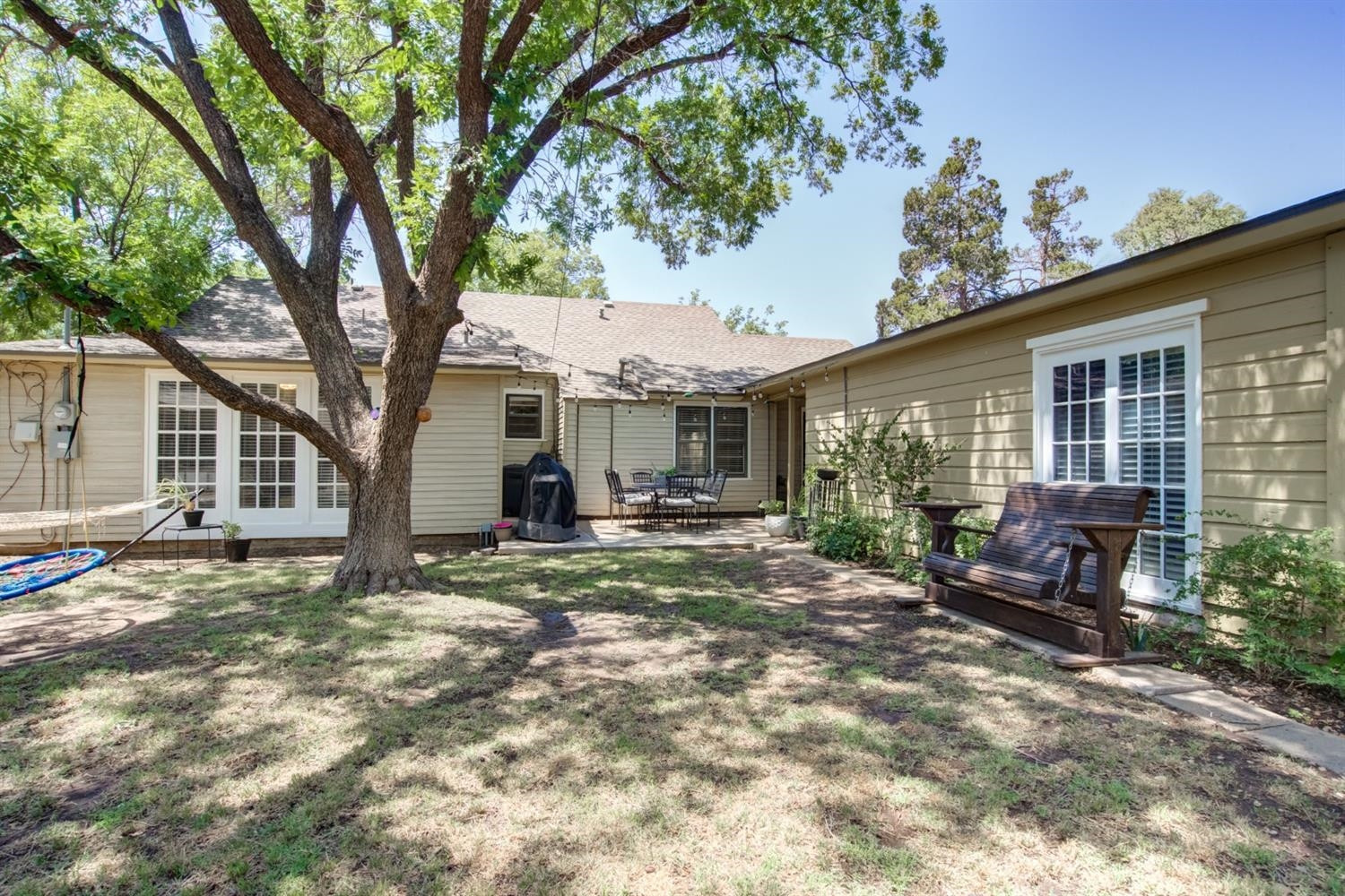 2714 29th Street Lubbock, TX 79410 - Photo 35 of 35 a view of a house with backyard and sitting area
