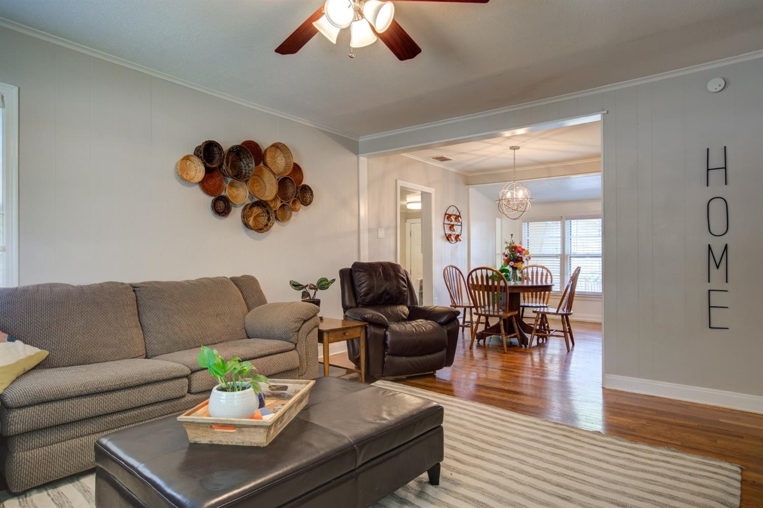 2714 29th Street Lubbock, TX 79410 - Photo 5 of 35 a living room with furniture kitchen view and a large window