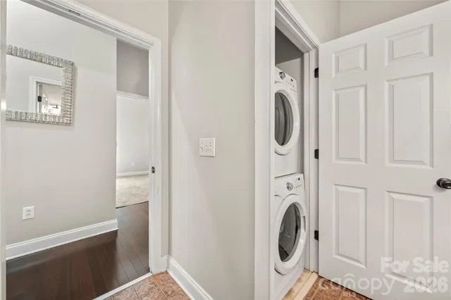 a view of a storage & utility room with a washer dryer