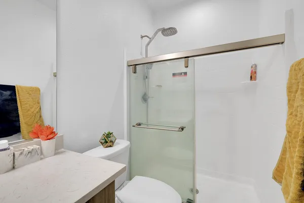 a bathroom with a sink and mirror
