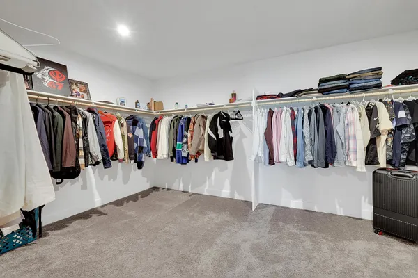 a view of livingroom with furniture and stairs