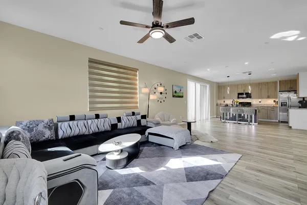a view of a living room and dining room