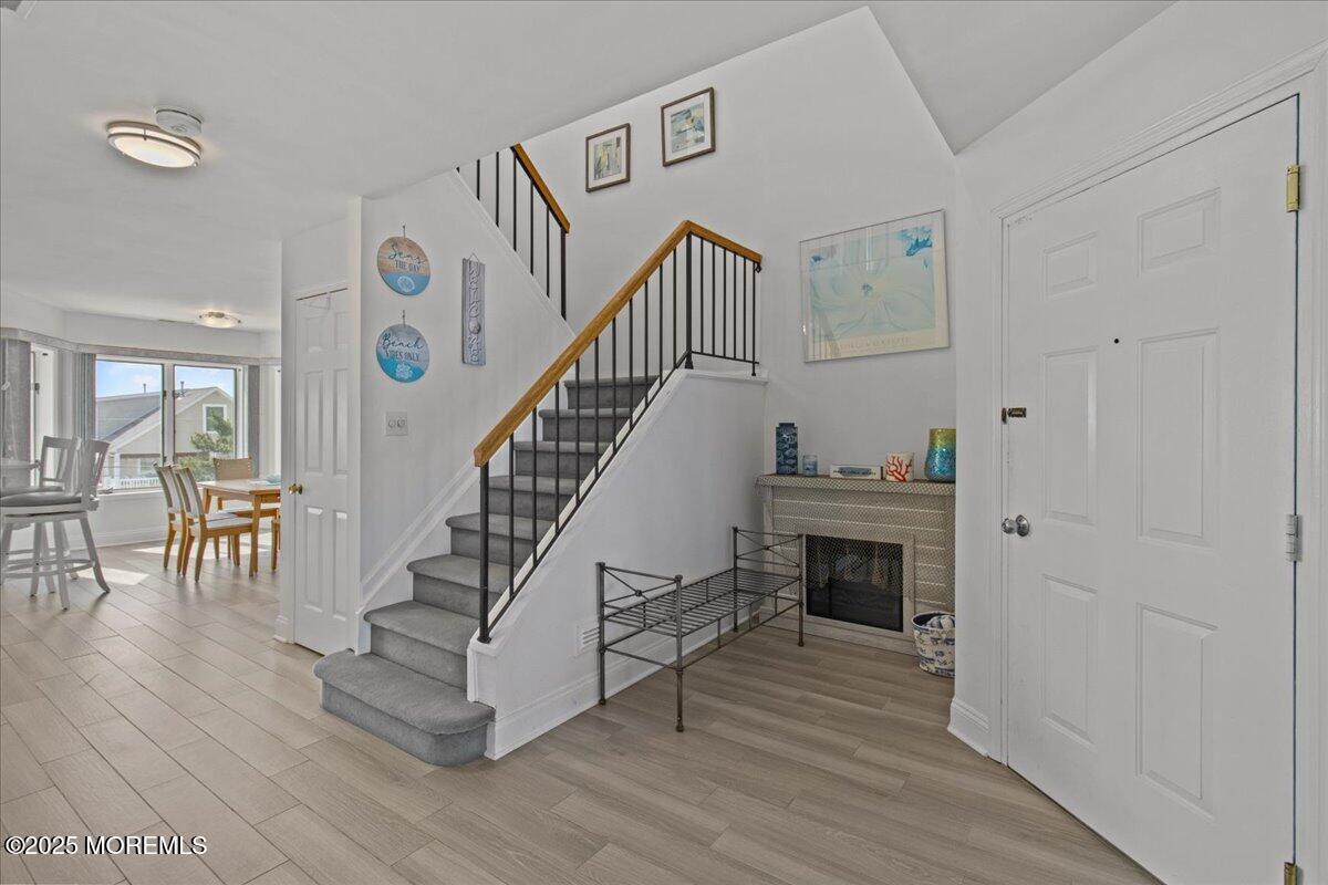 30 Dune Terrace Seaside Heights, NJ 08751 - Photo 14 of 42 a view of entryway livingroom and hall with wooden floor