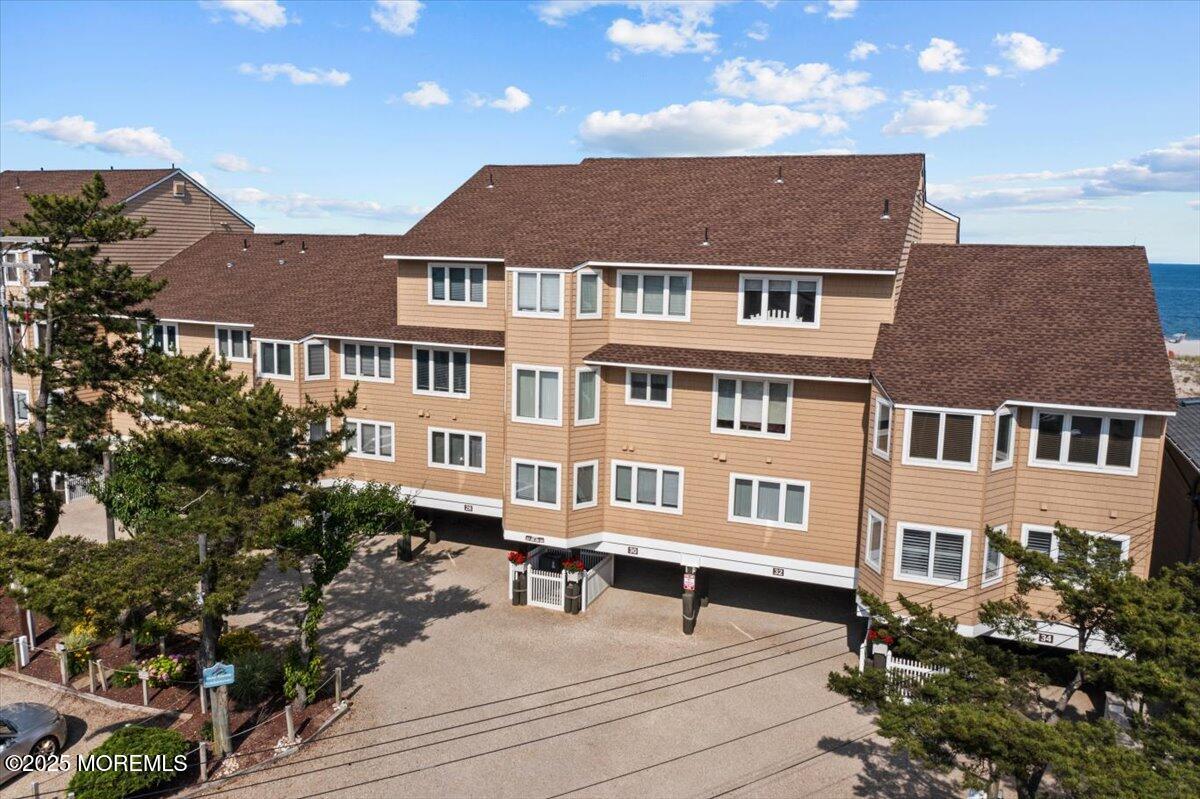 30 Dune Terrace Seaside Heights, NJ 08751 - Photo 2 of 42 a front view of a house with a yard
