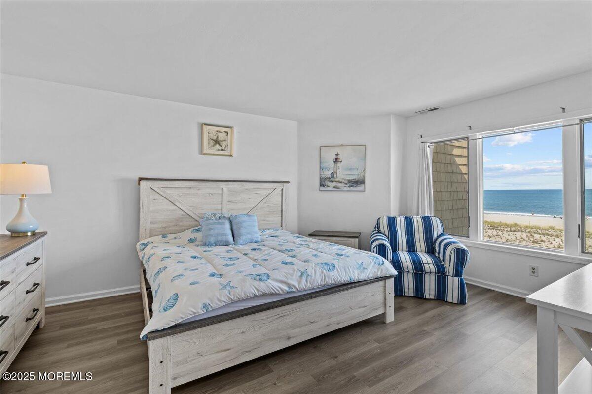 30 Dune Terrace Seaside Heights, NJ 08751 - Photo 28 of 42 a bedroom with a bed and a window
