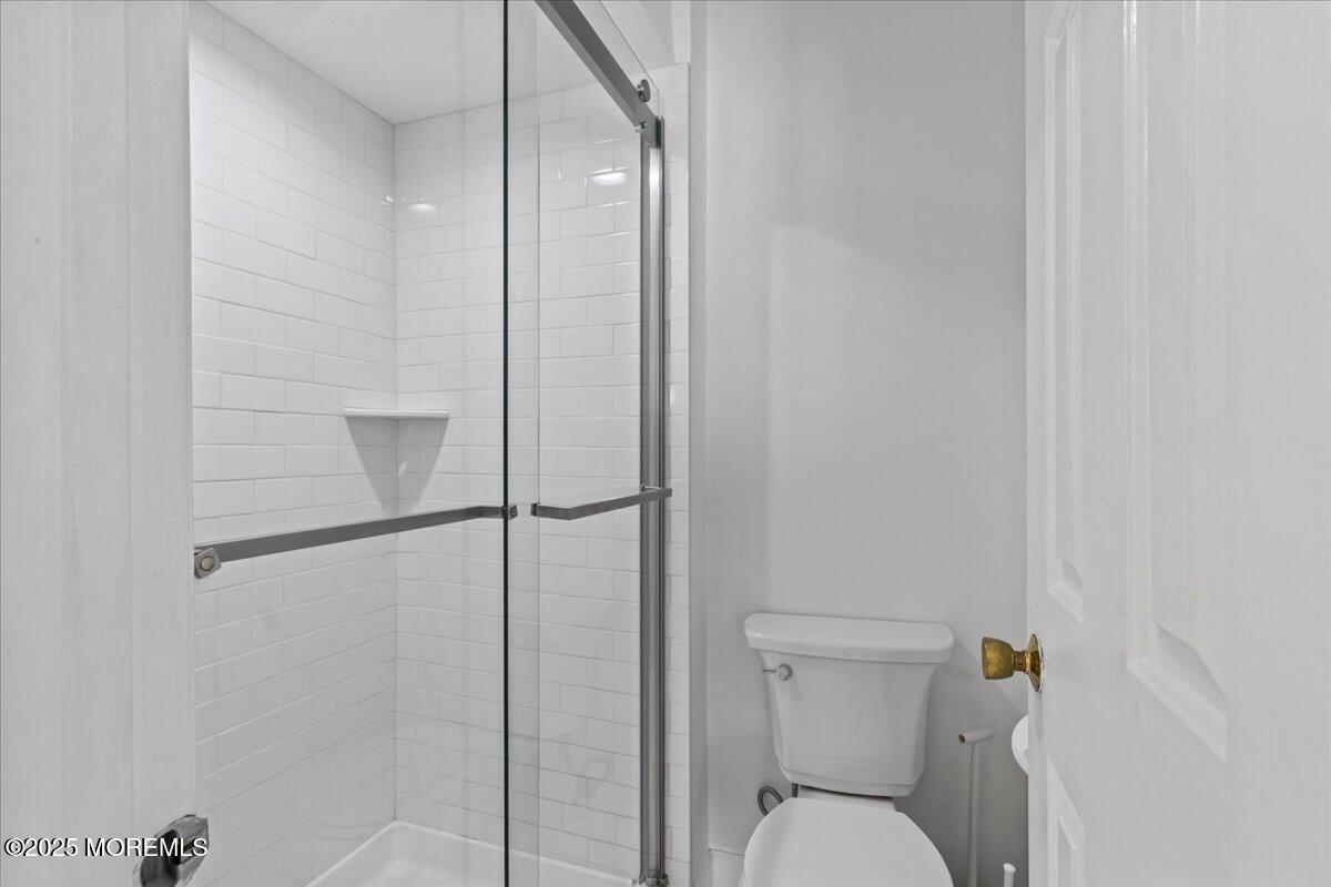 30 Dune Terrace Seaside Heights, NJ 08751 - Photo 32 of 42 a bathroom with a toilet