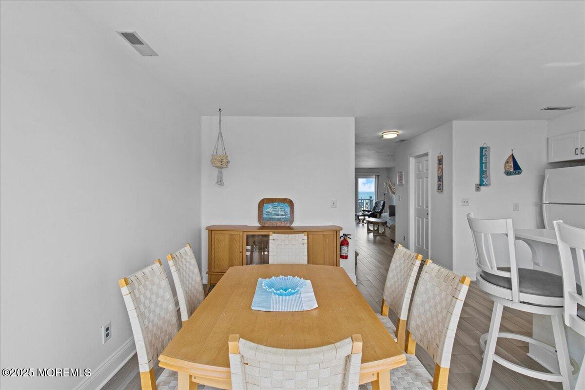 30 Dune Terrace Seaside Heights, NJ 08751 - Photo 8 of 42 a view of a dining room with furniture
